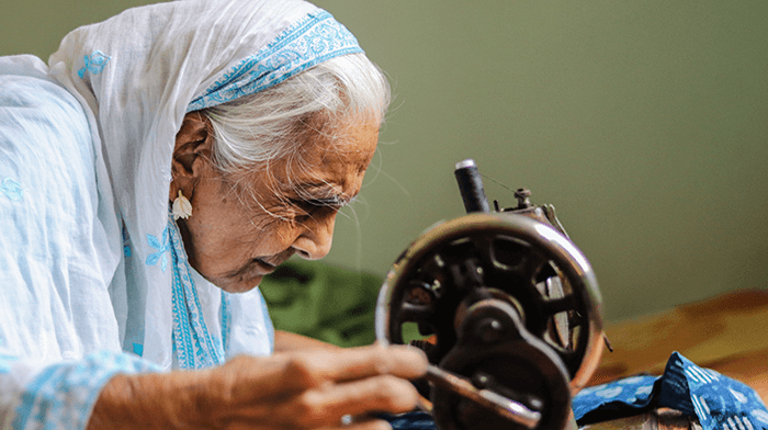 Indian woman sewing_Quilt Festival