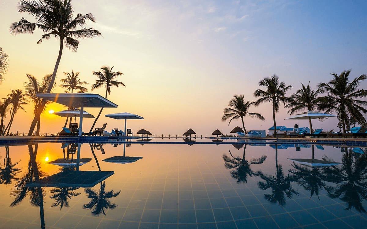  pool-side-dusk Mamallapuram Hotel Keneces Palm Beach